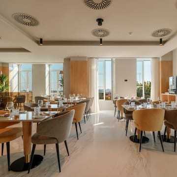 a room with tables and chairs