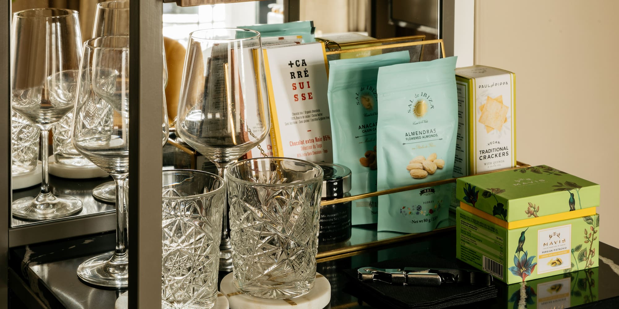 a shelf with glasses and other items