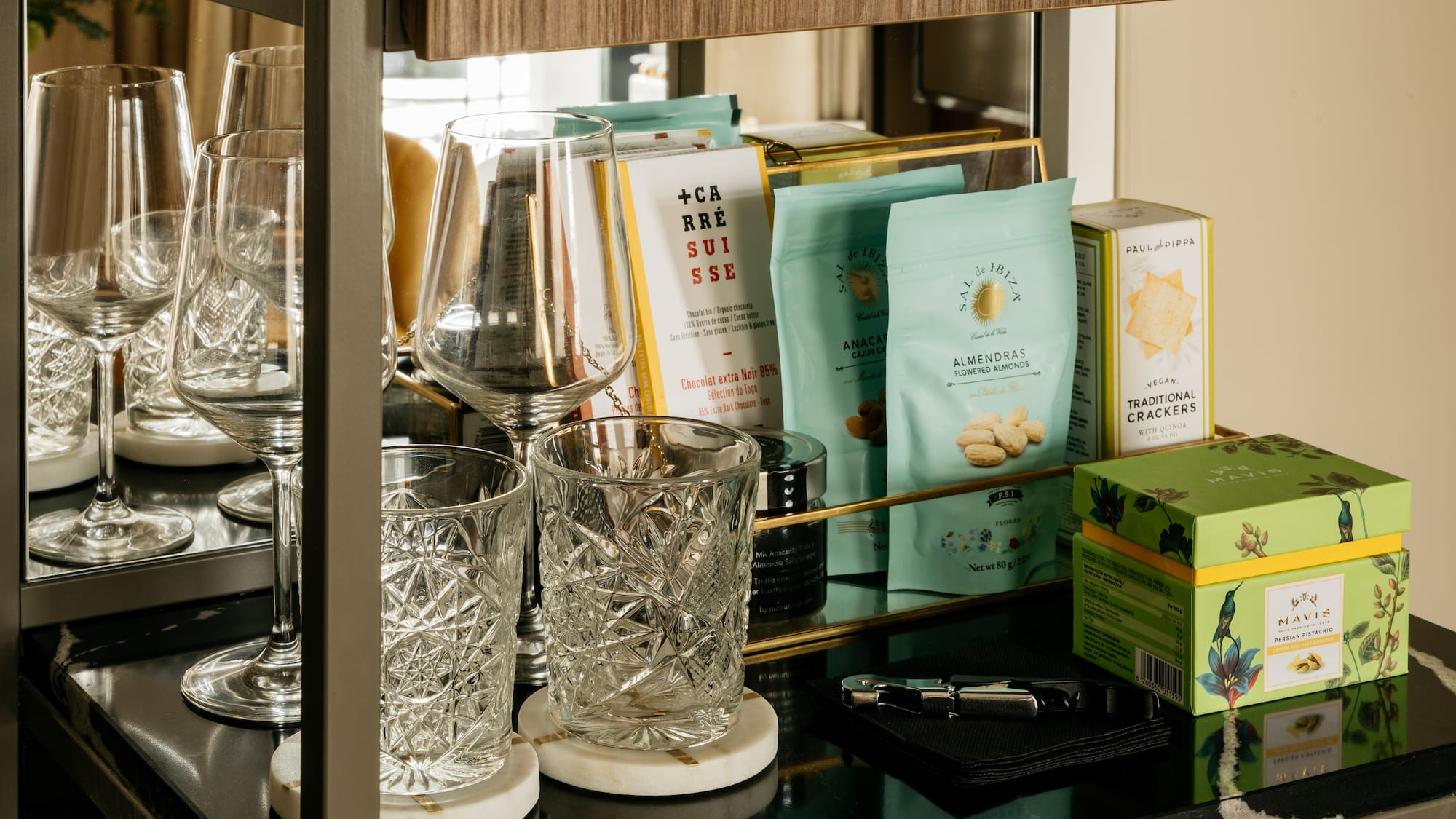 a shelf with glasses and other items