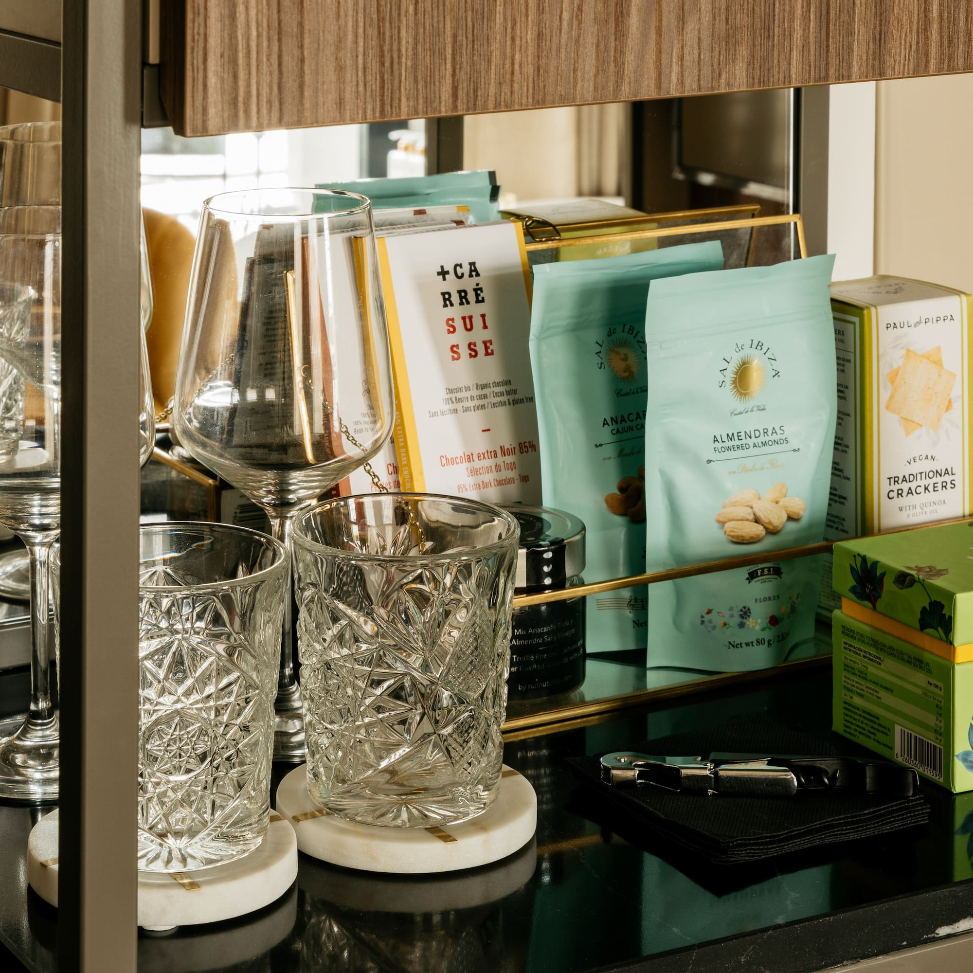 a shelf with glasses and other items