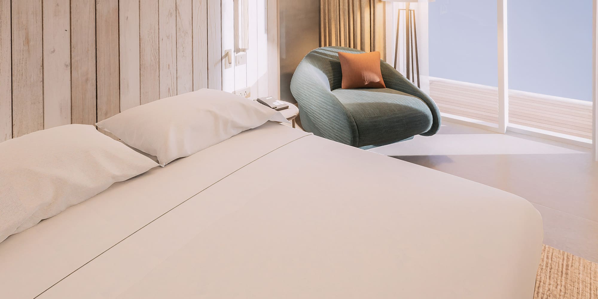 a bed and chair in a room