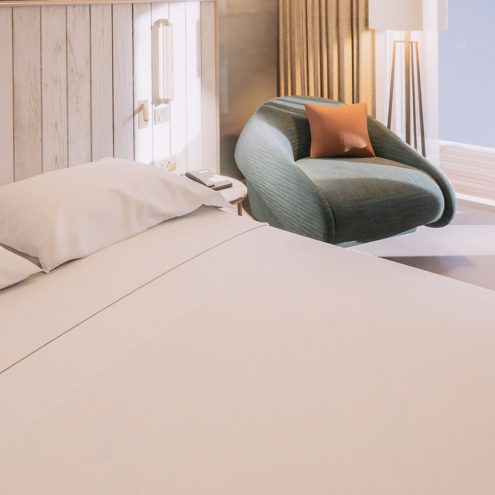 a bed and chair in a room