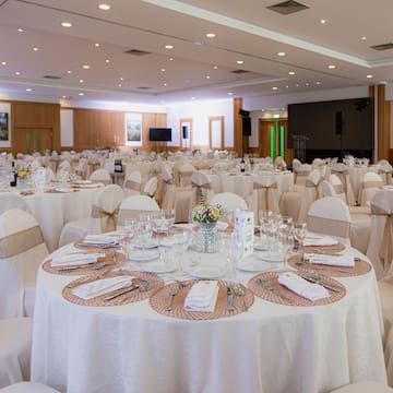 a room with tables and chairs