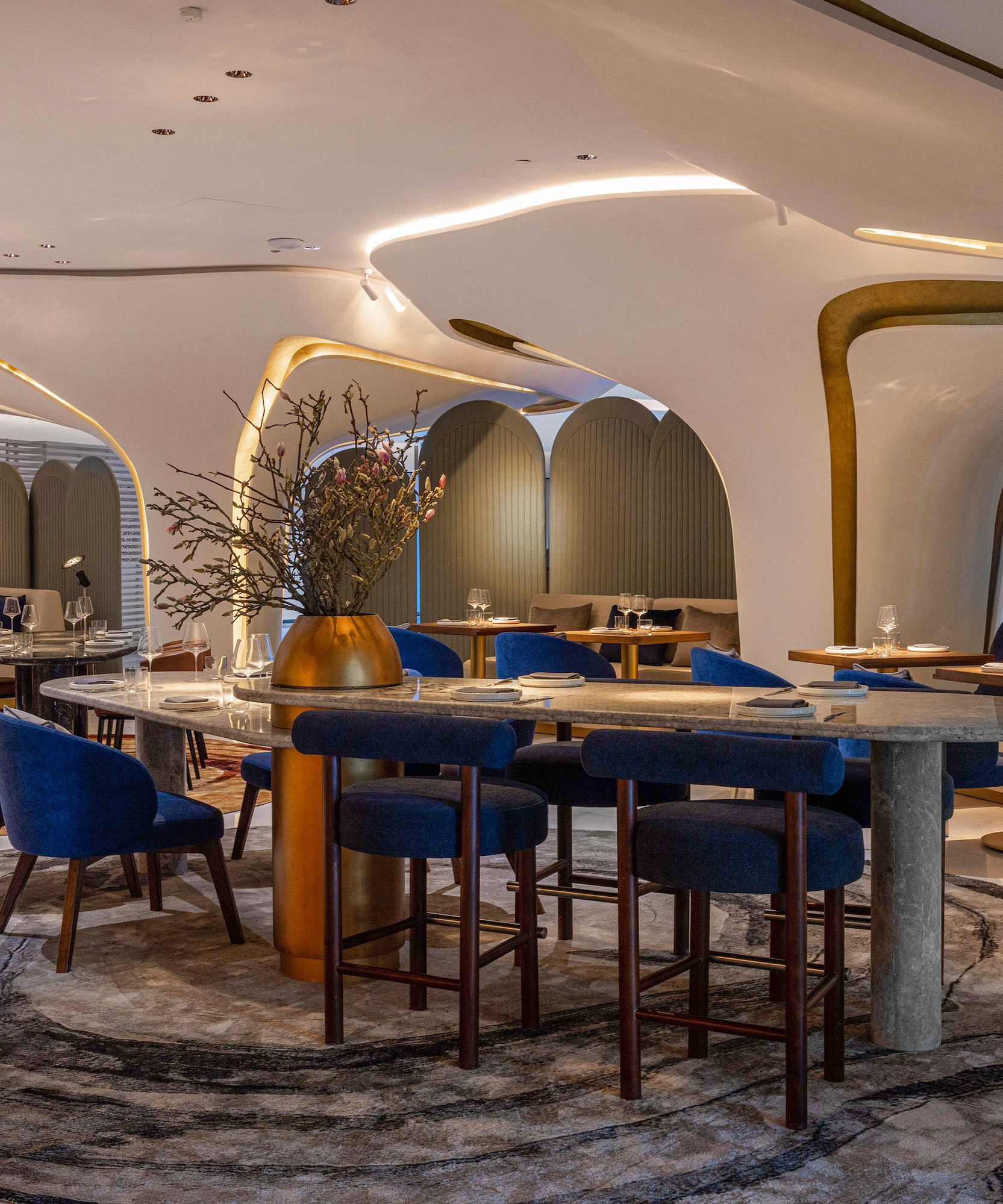 a room with tables and chairs