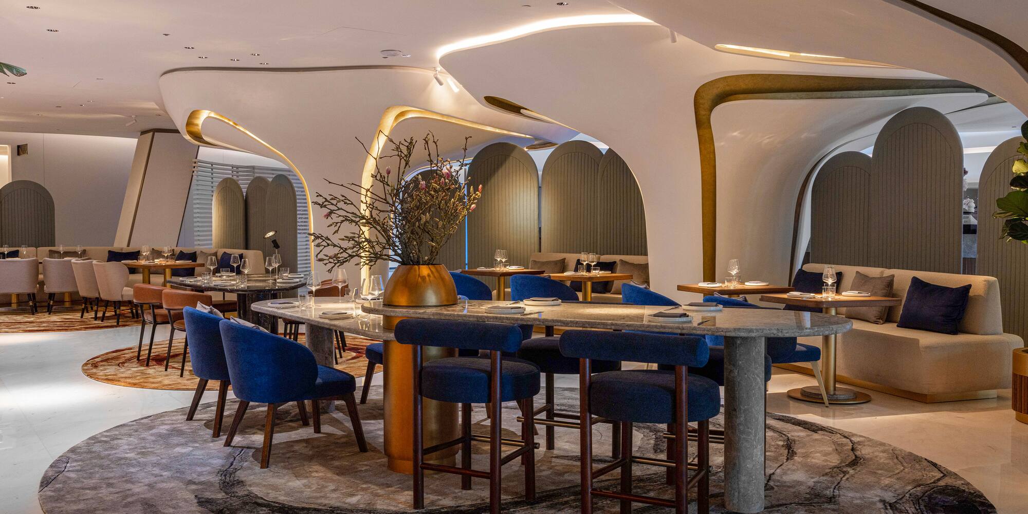 a room with tables and chairs