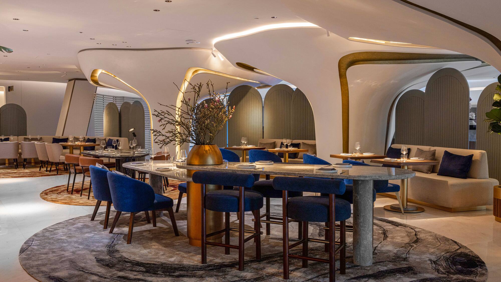 a room with tables and chairs