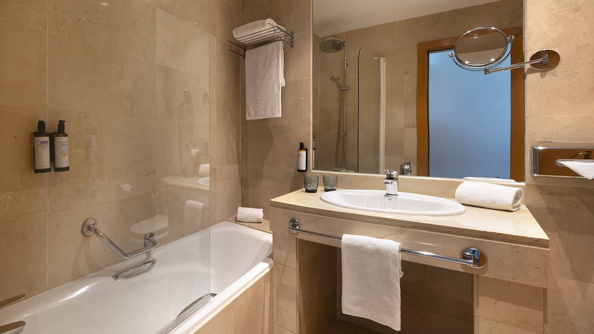 a bathroom with a bathtub and sink