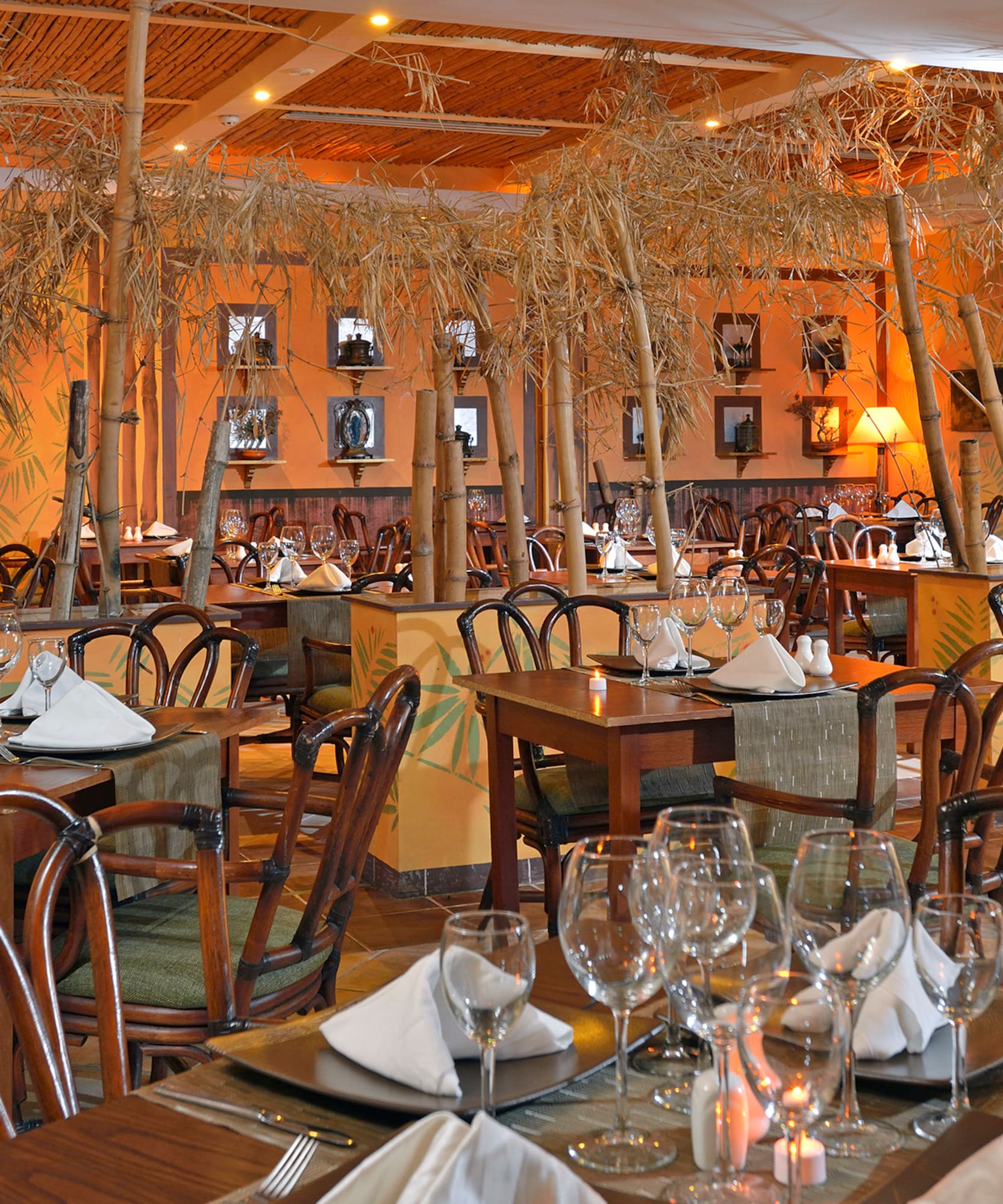 a restaurant with tables and chairs