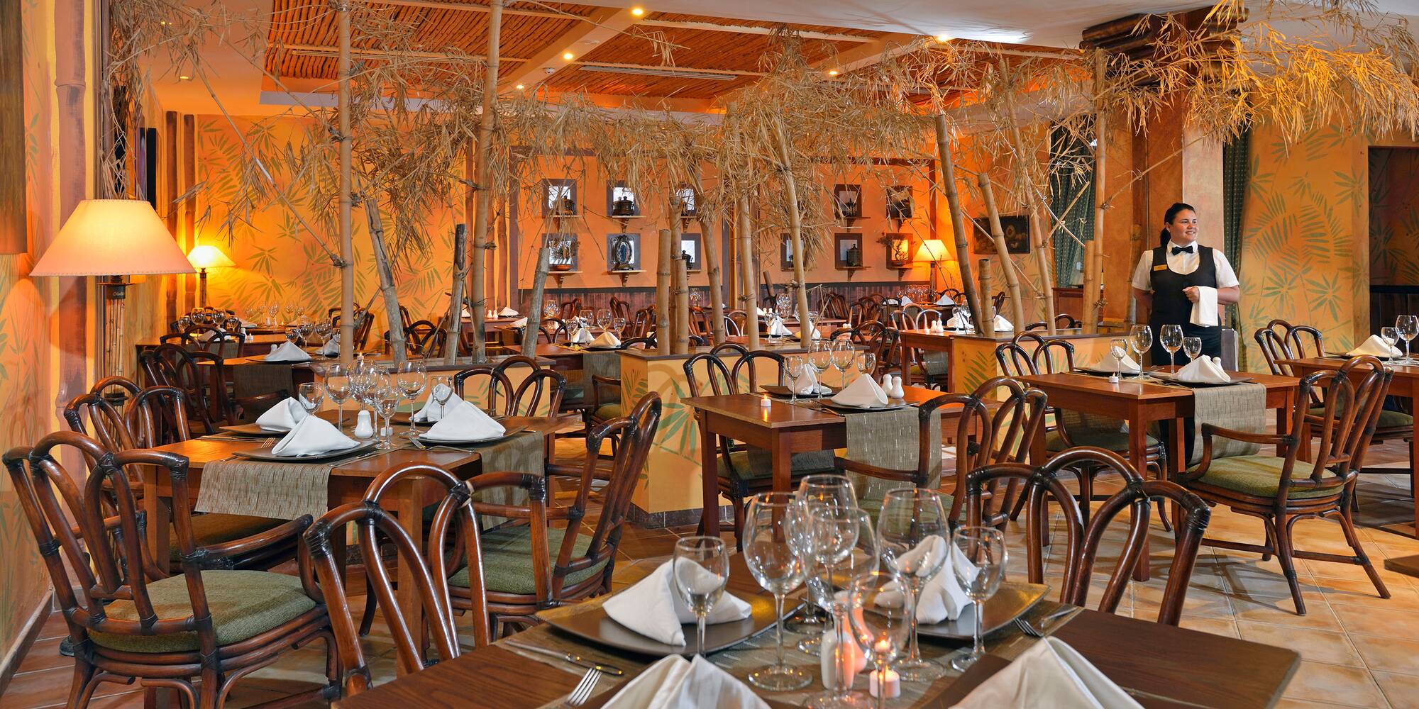 a restaurant with tables and chairs