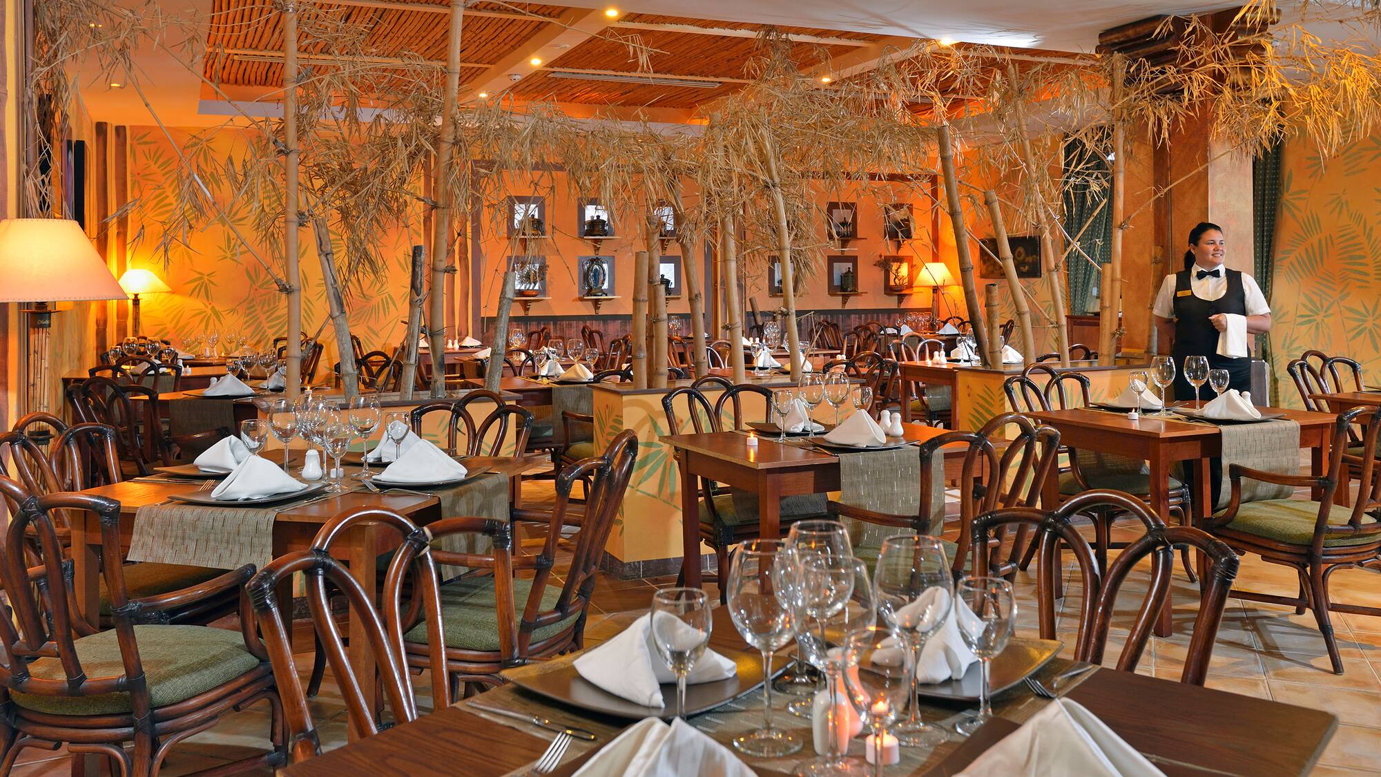 a restaurant with tables and chairs