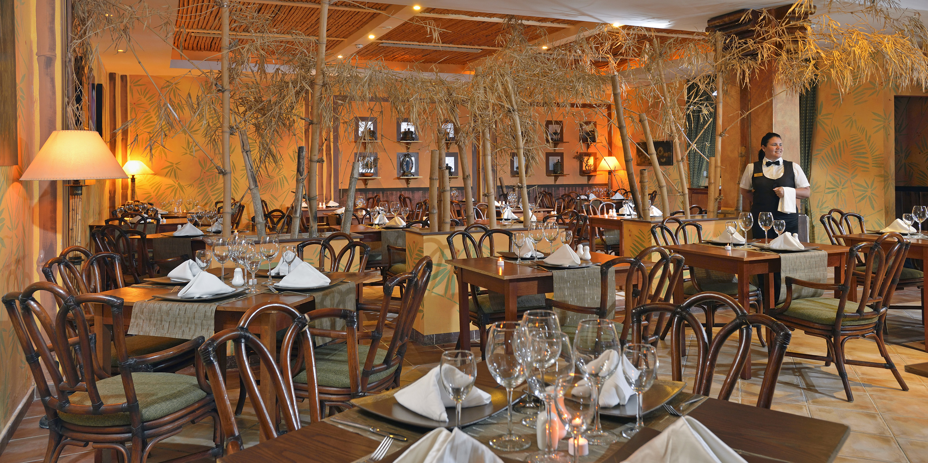 a restaurant with tables and chairs