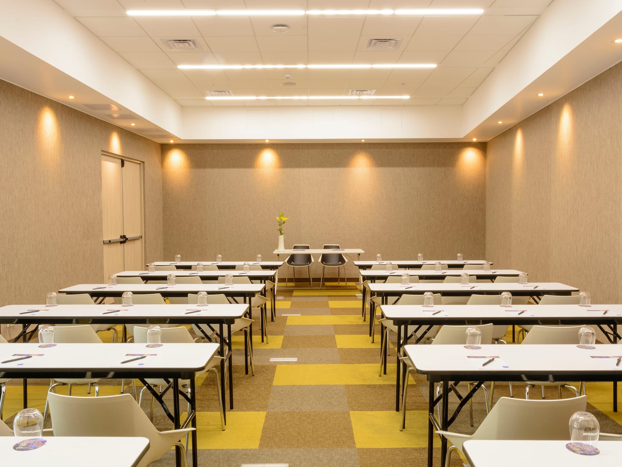 a room with tables and chairs
