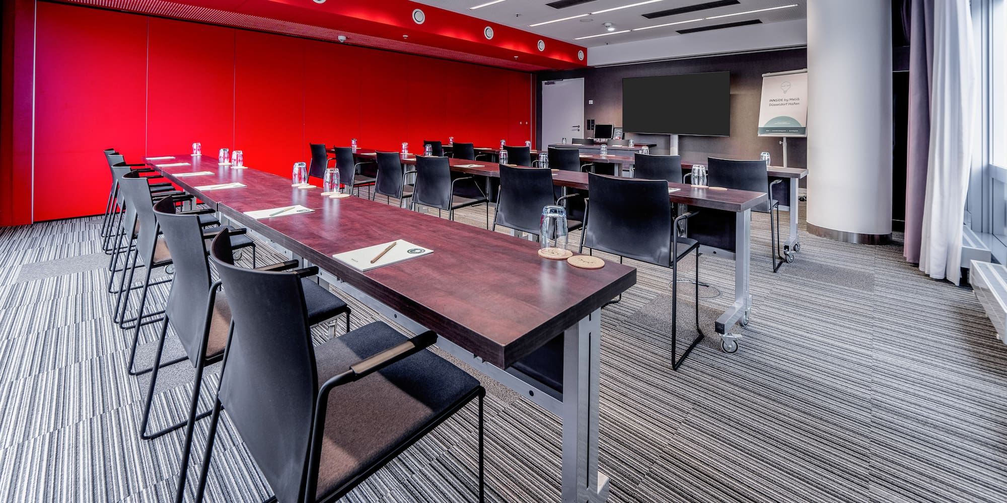 a room with tables and chairs