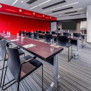 a room with tables and chairs