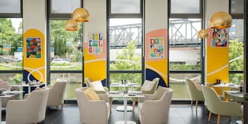 a room with chairs and tables