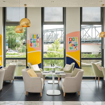 a room with chairs and tables