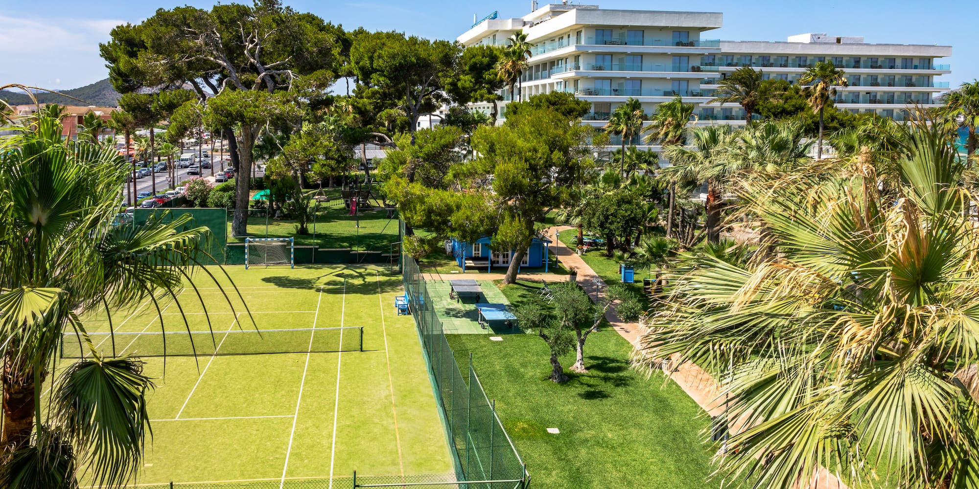 a tennis court and trees