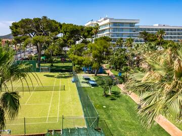 a tennis court and trees