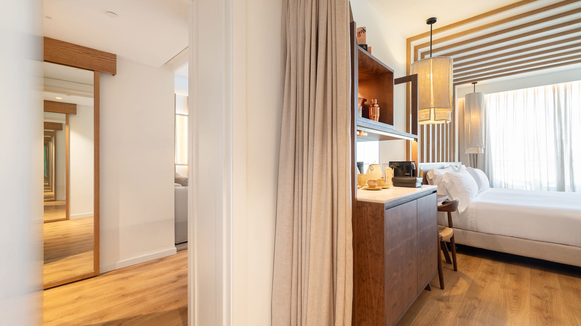 a room with a bed and a cabinet