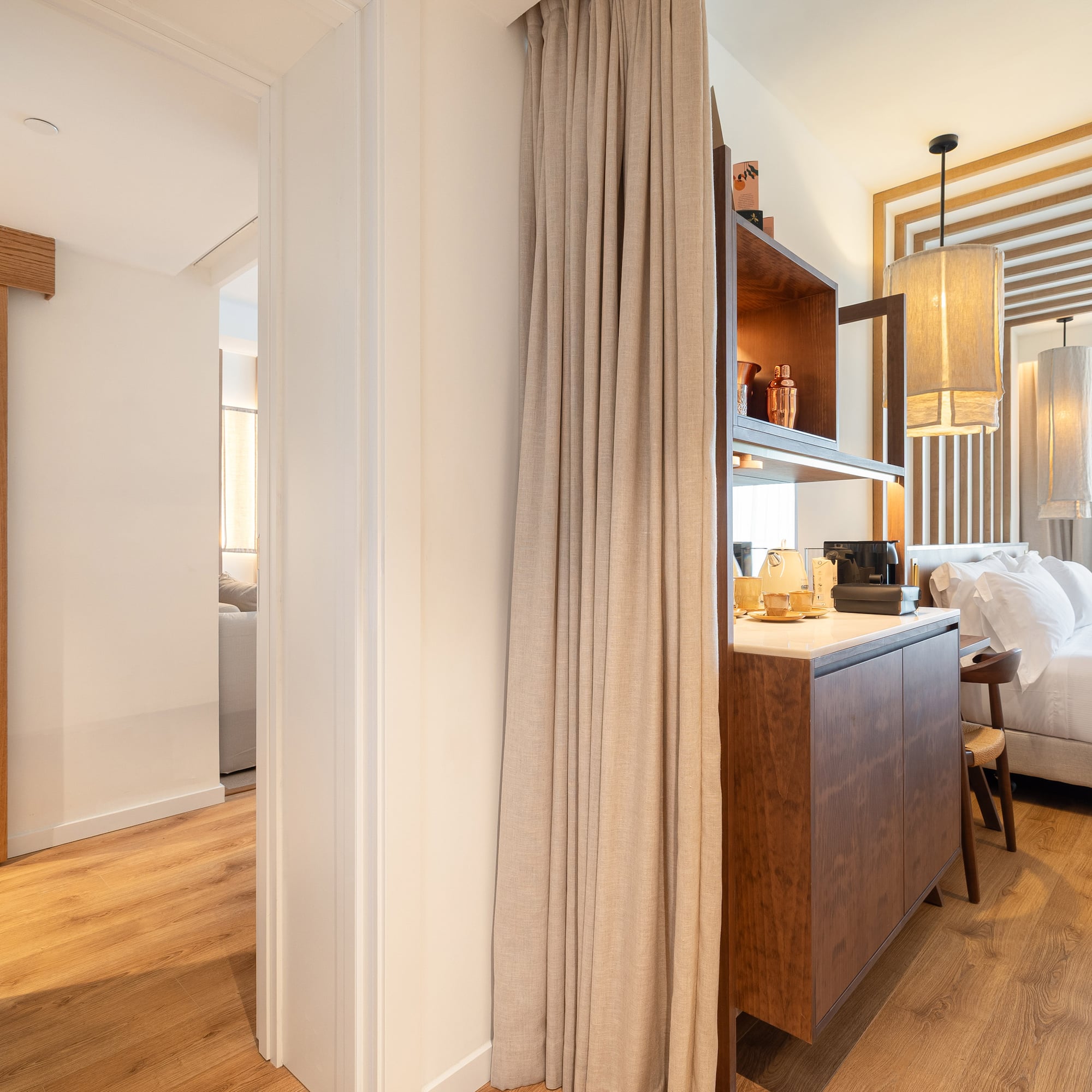 a room with a bed and a cabinet