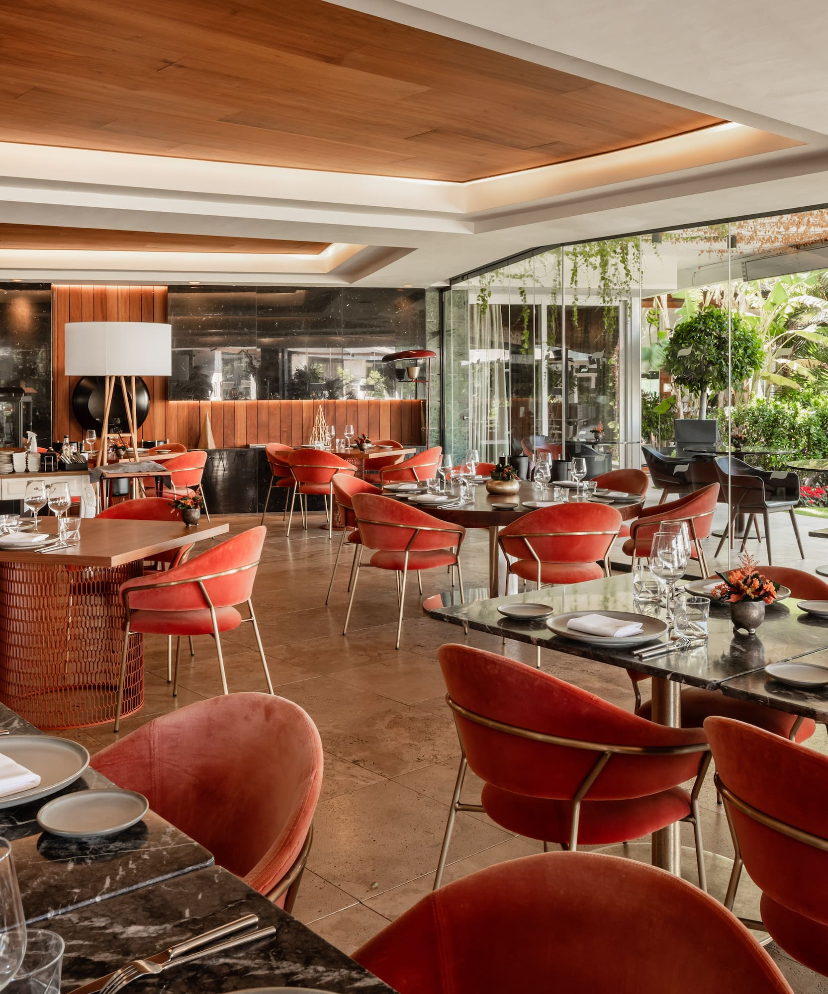 a restaurant with tables and chairs