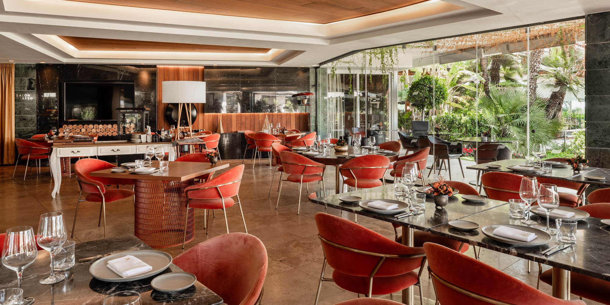 a restaurant with tables and chairs