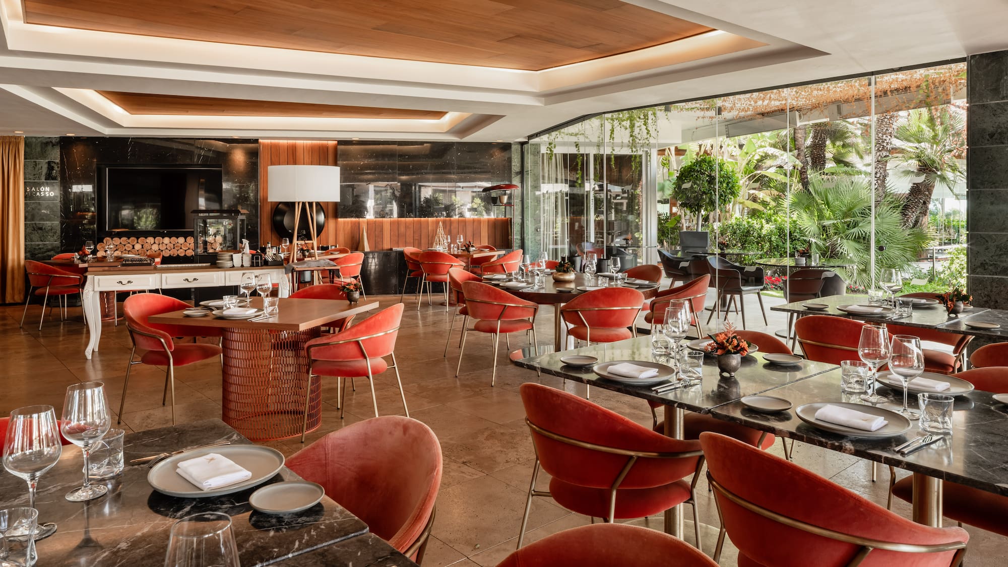 a restaurant with tables and chairs