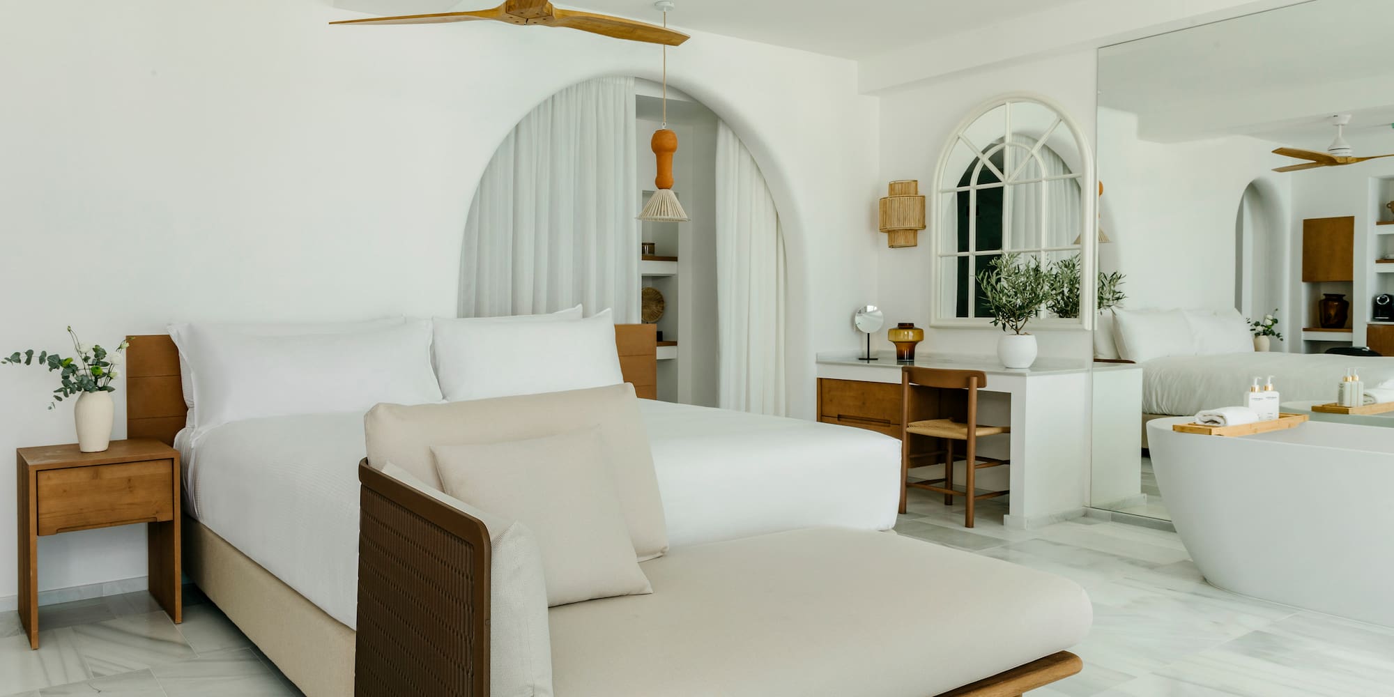 a bedroom with a bed and a desk