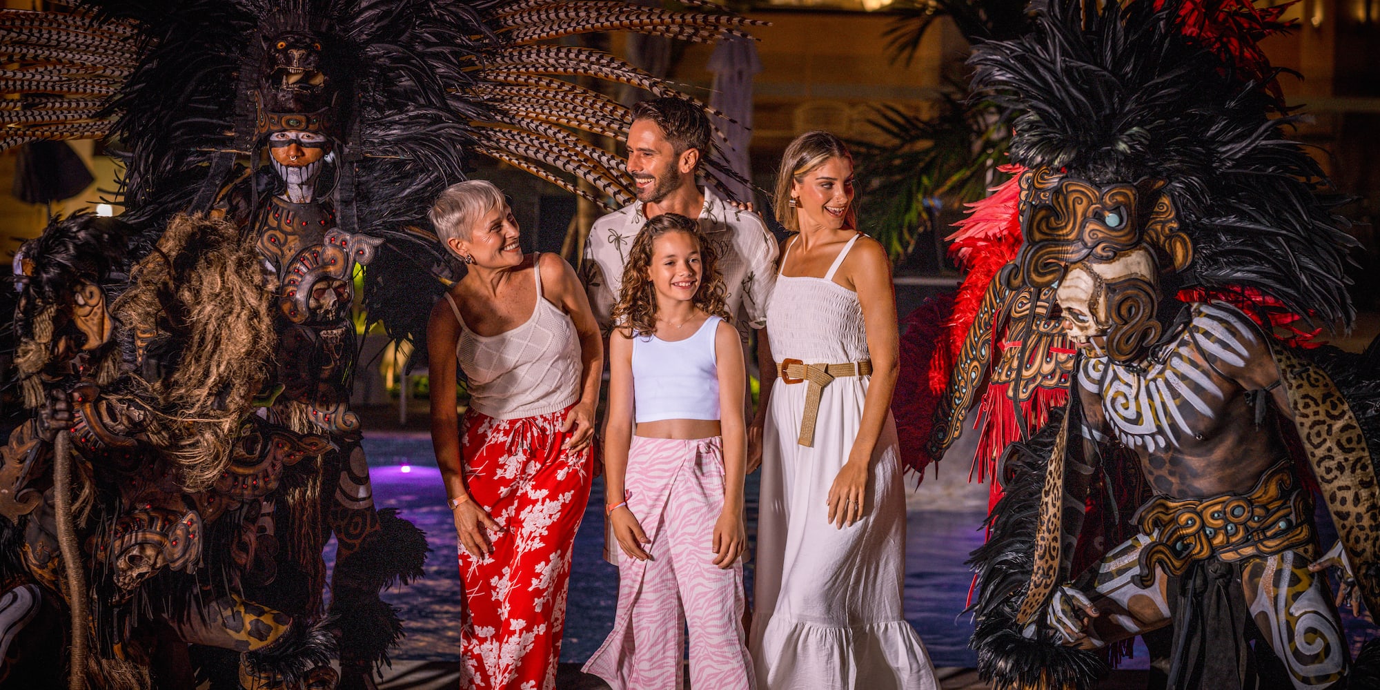 a group of people standing next to a group of people