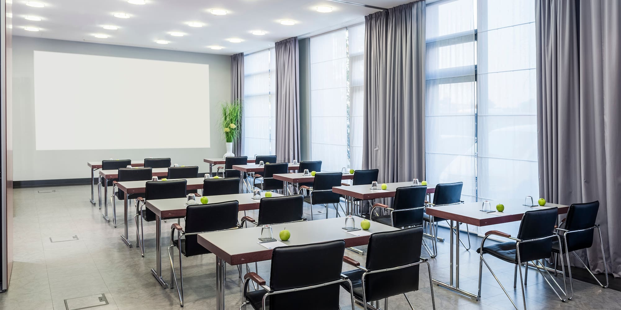 a room with tables and chairs