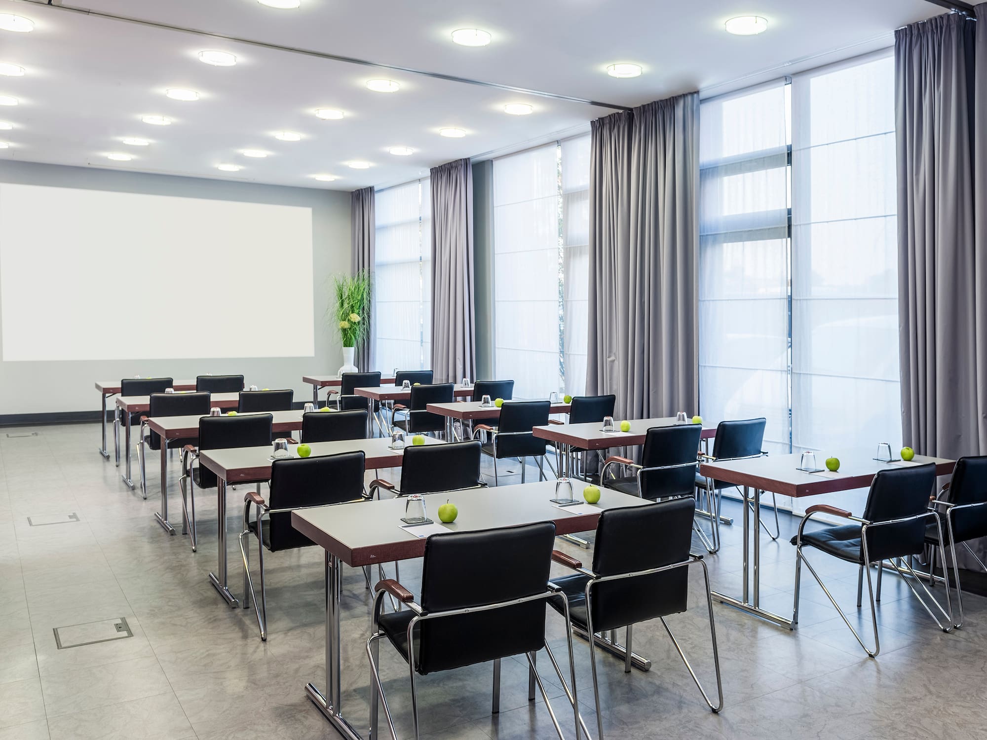 a room with tables and chairs