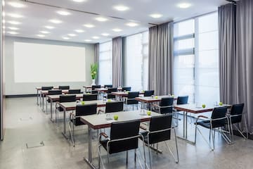 a room with tables and chairs