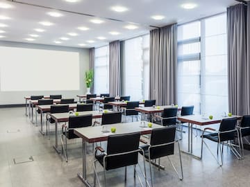 a room with tables and chairs