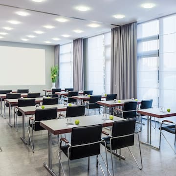 a room with tables and chairs