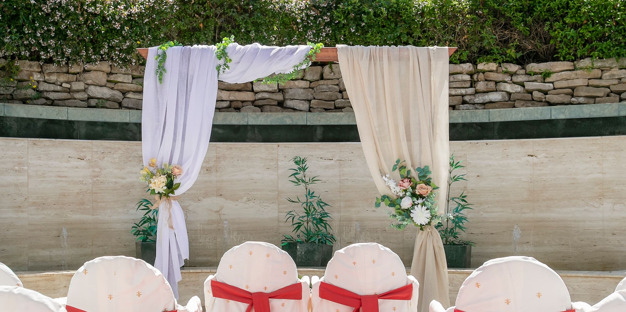 chairs with red and white chairs and white curtains