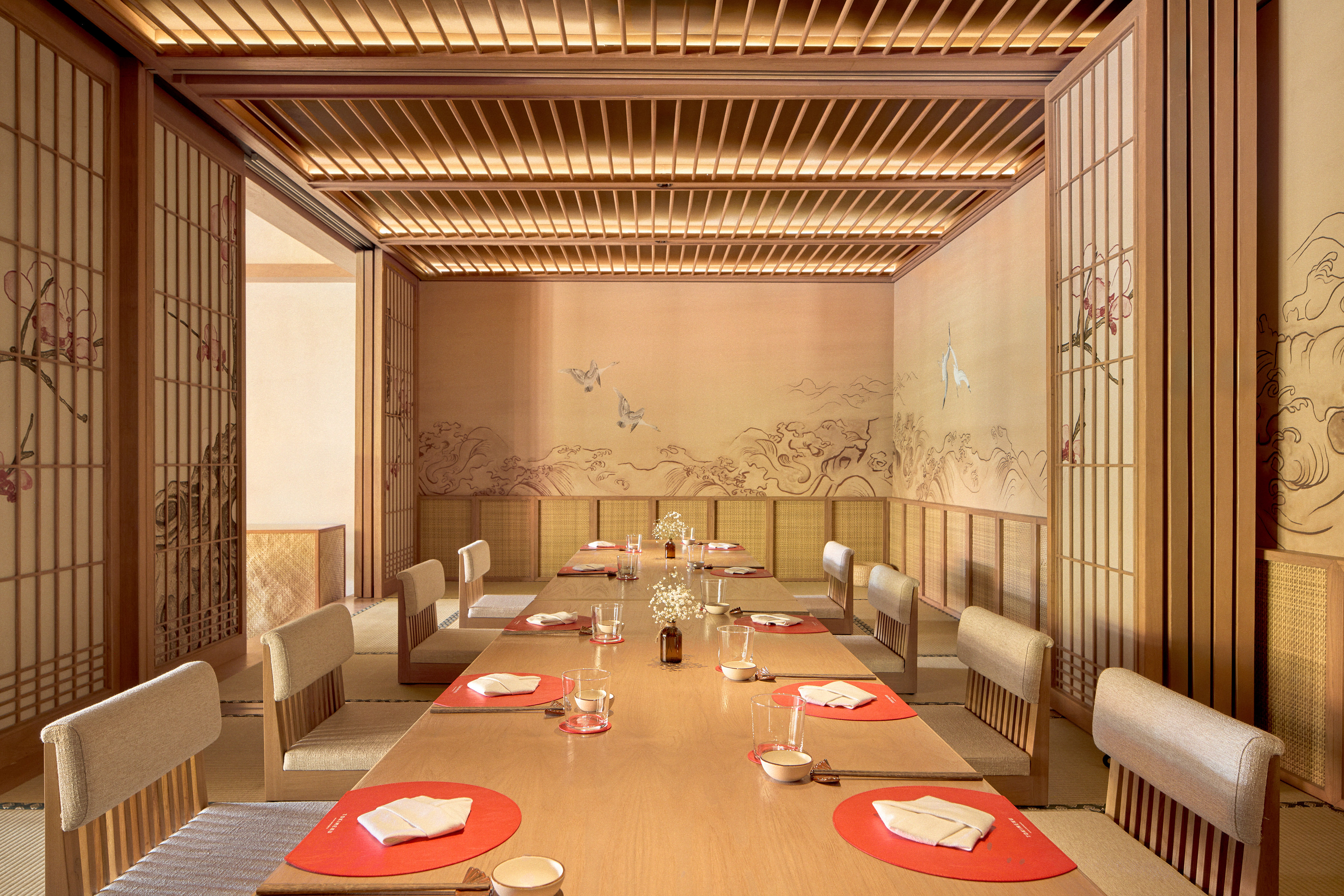 a room with a table and chairs