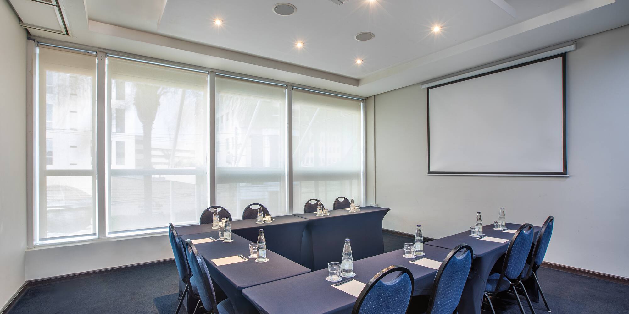 a room with tables and chairs
