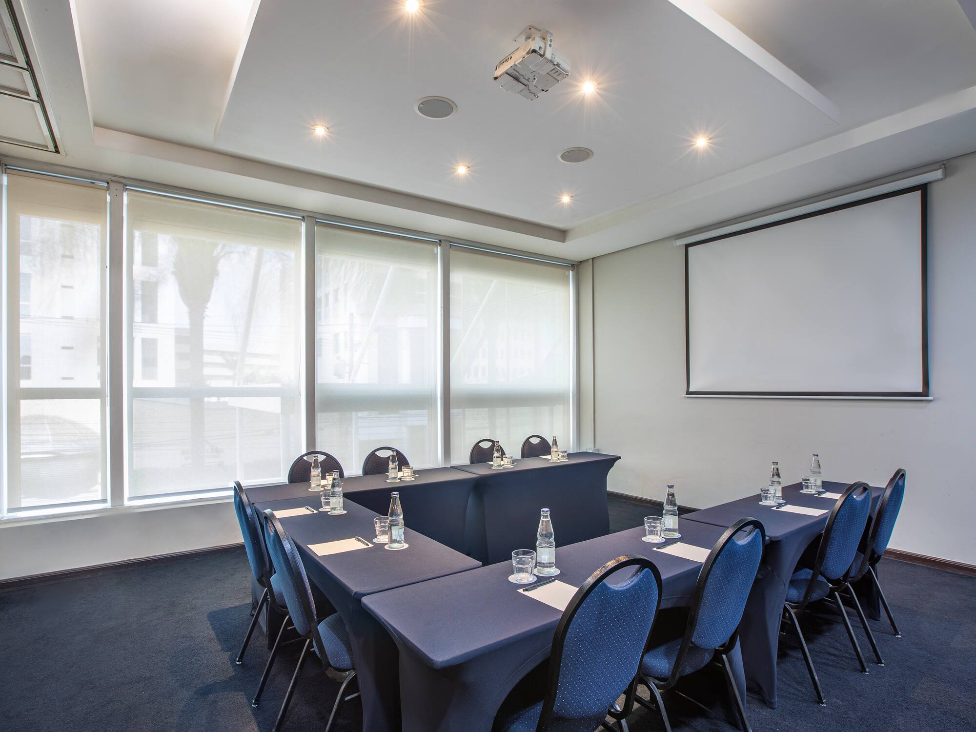 a room with tables and chairs