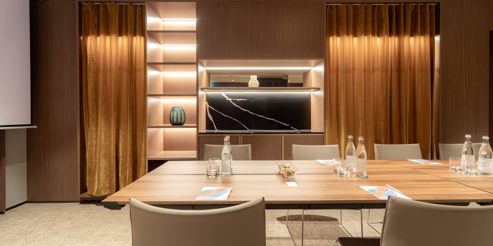 a room with a table and chairs