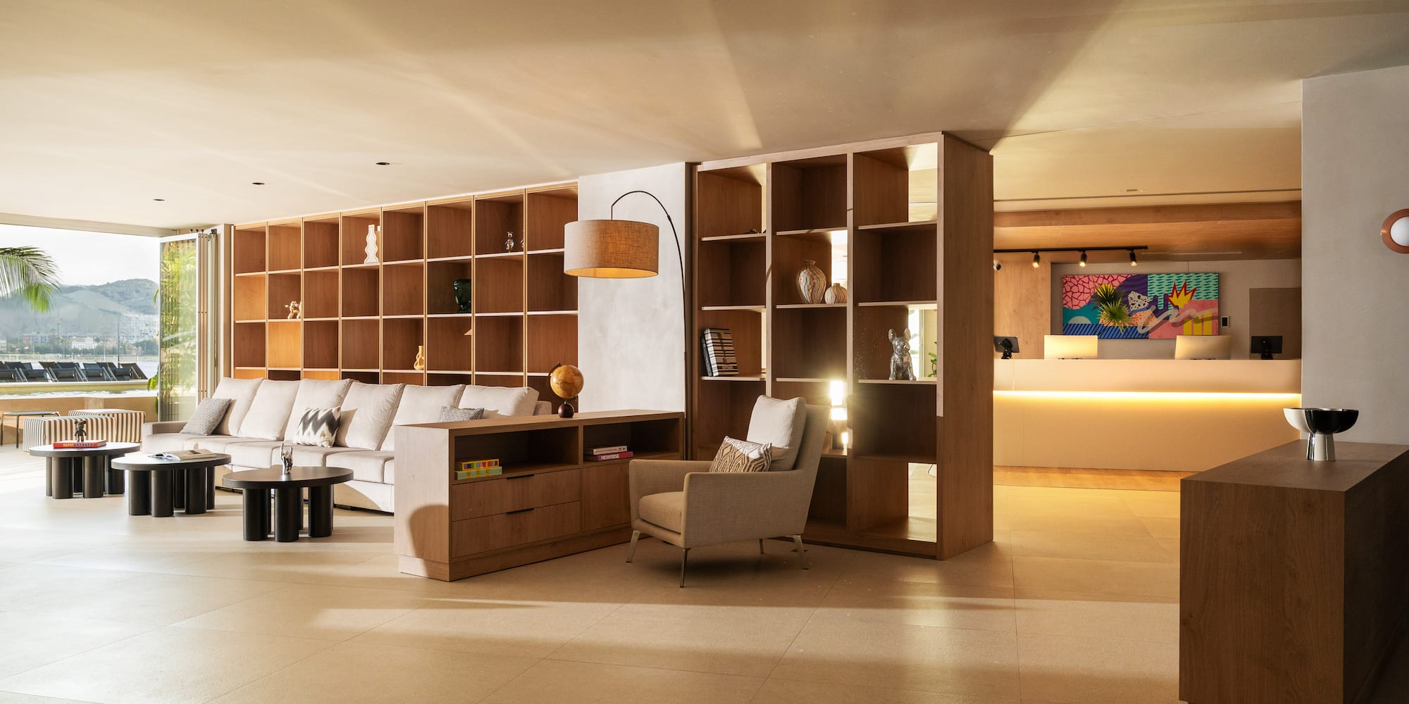 a room with a couch and shelves