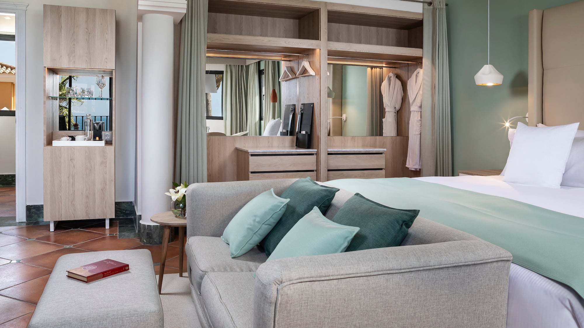 a room with a bed and a couch