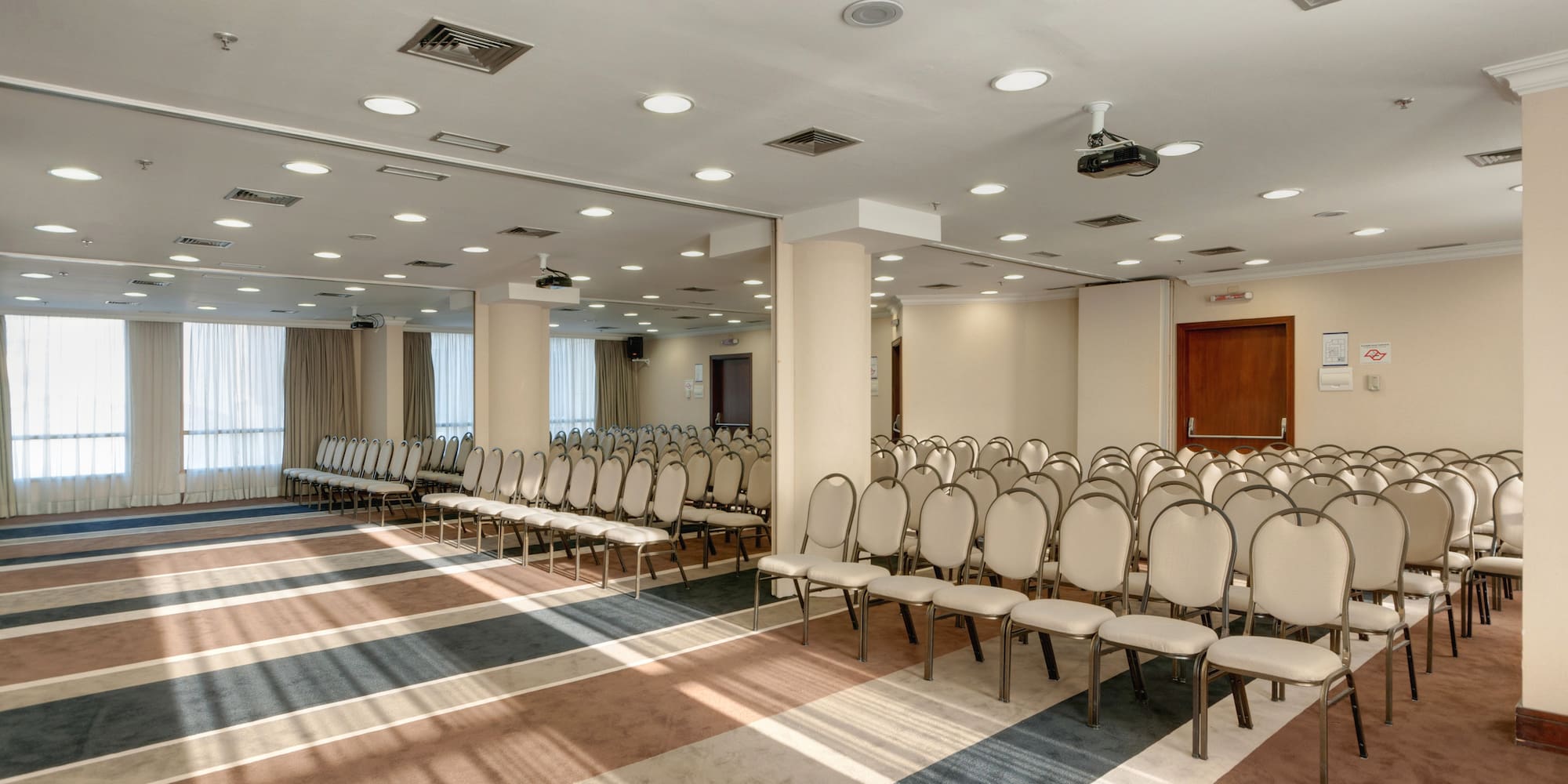 a room with rows of chairs