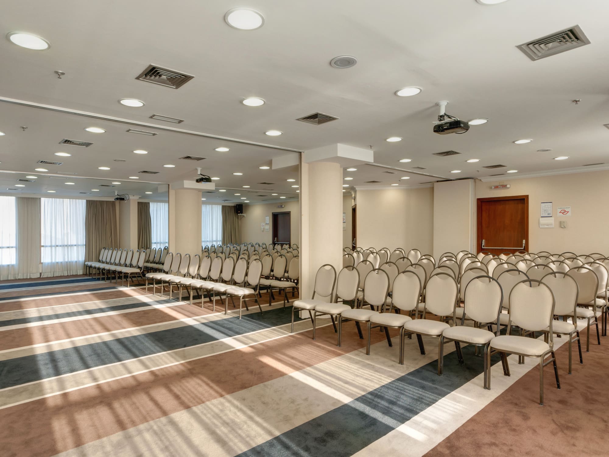 a room with rows of chairs