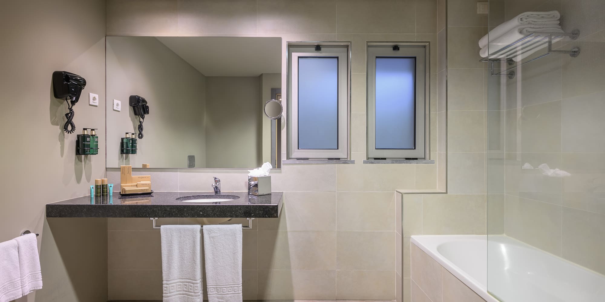 a bathroom with a sink and bathtub