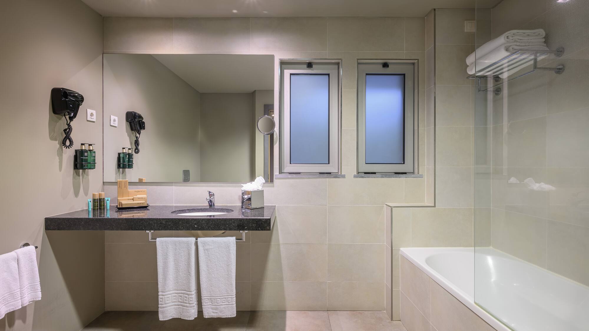 a bathroom with a sink and bathtub