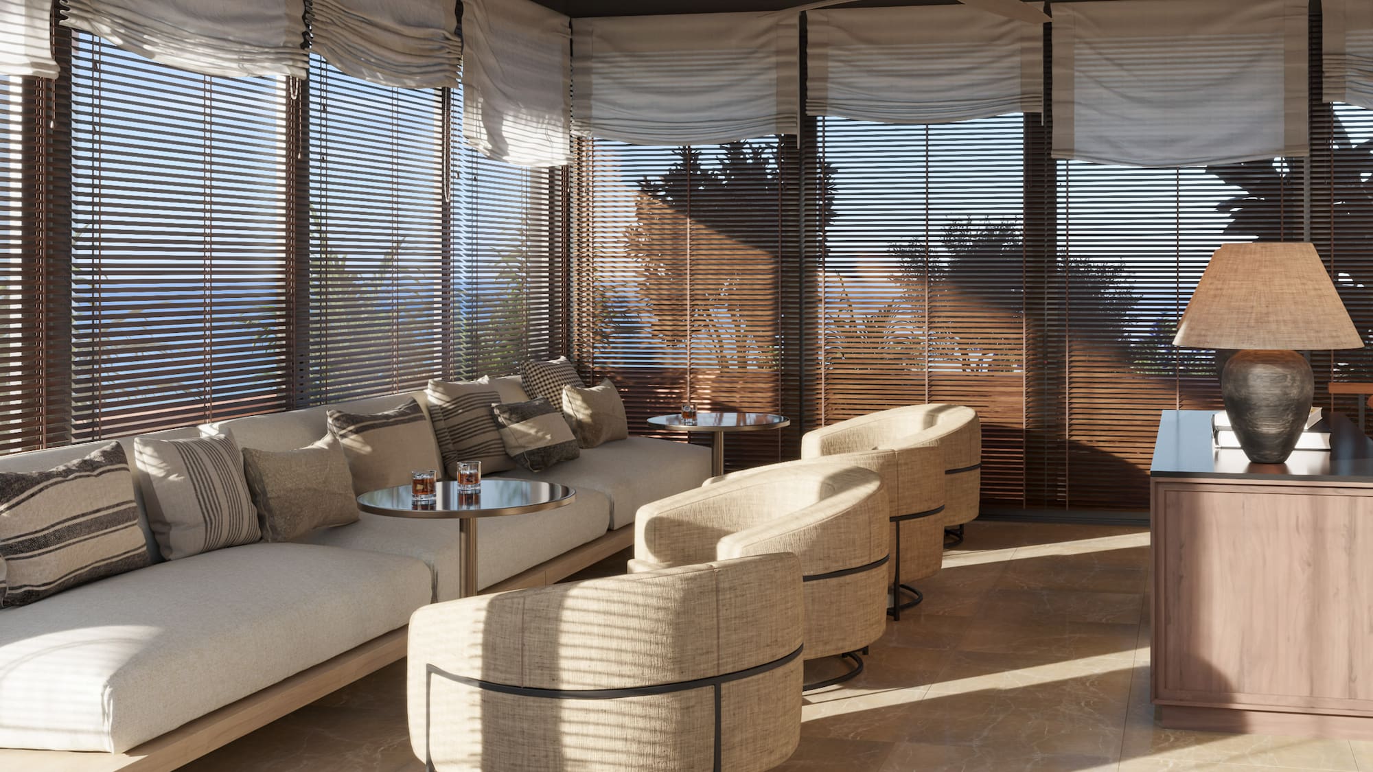 a room with a couch and chairs