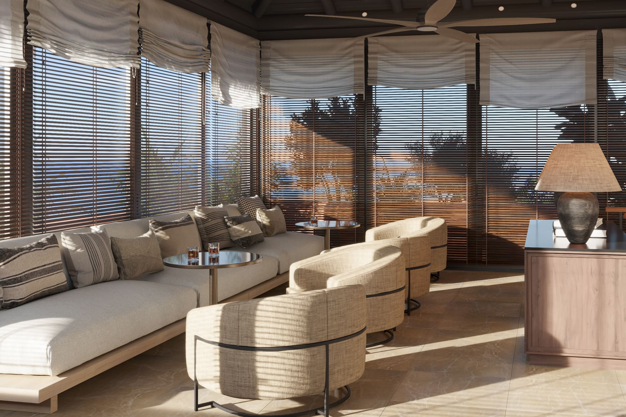 a room with a couch and chairs