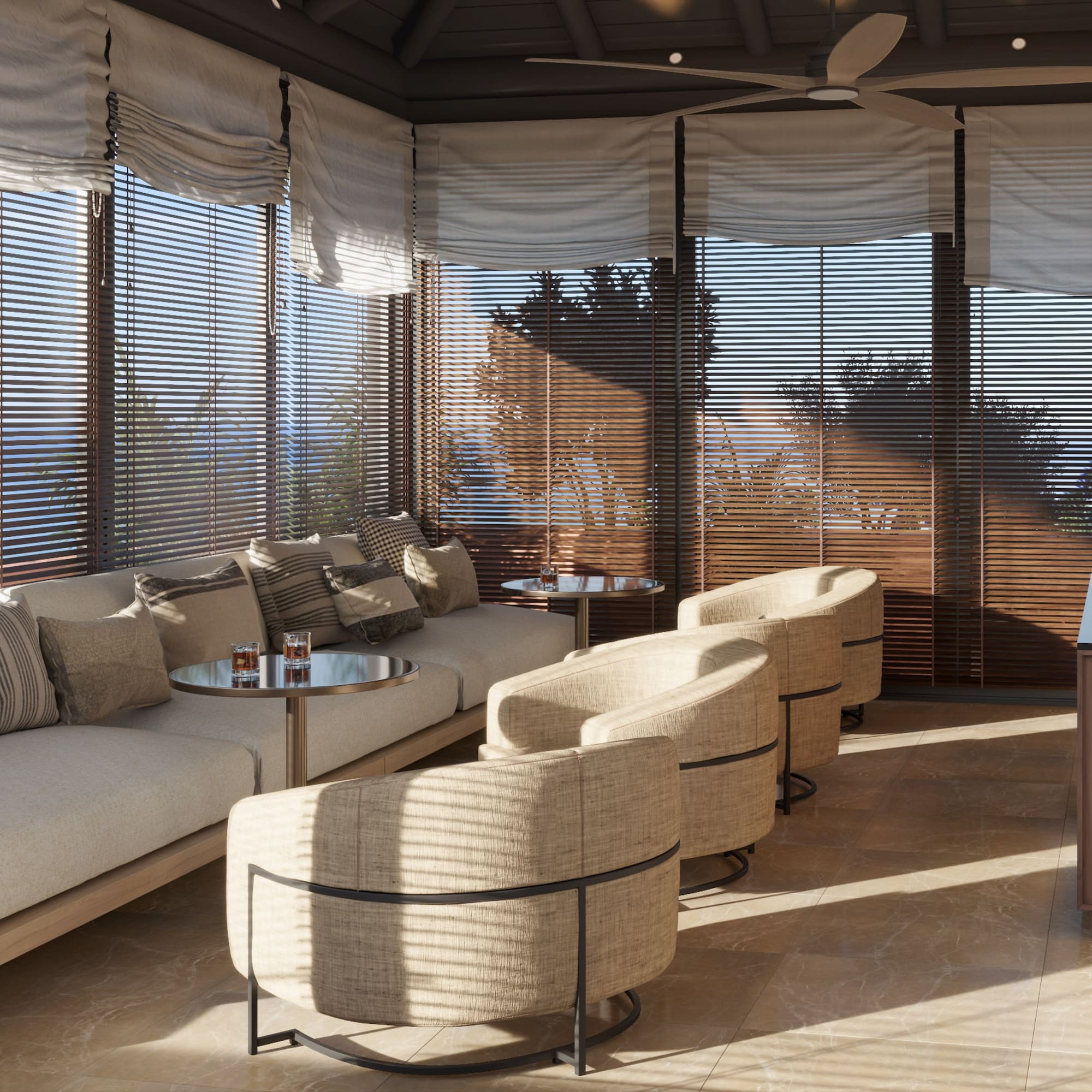 a room with a couch and chairs