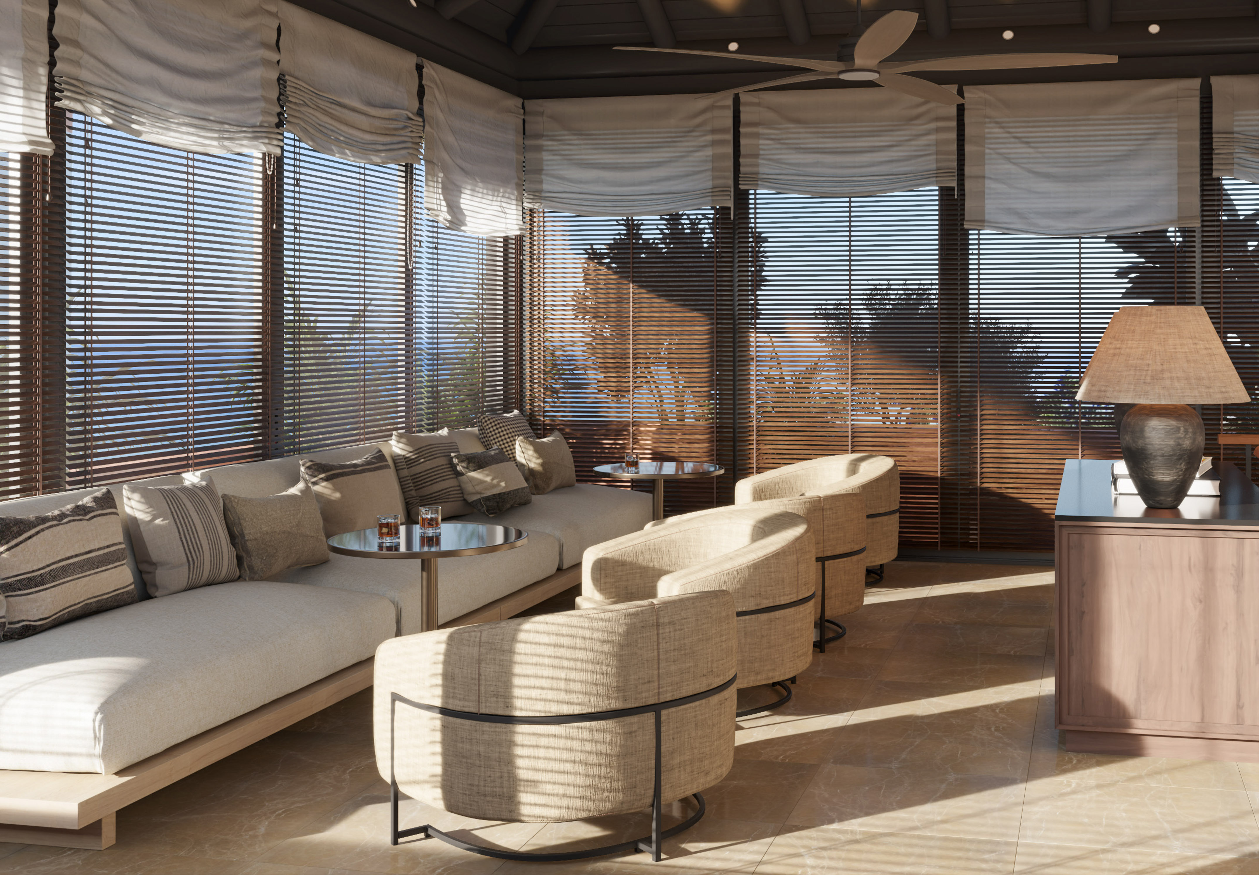 a room with a couch and chairs