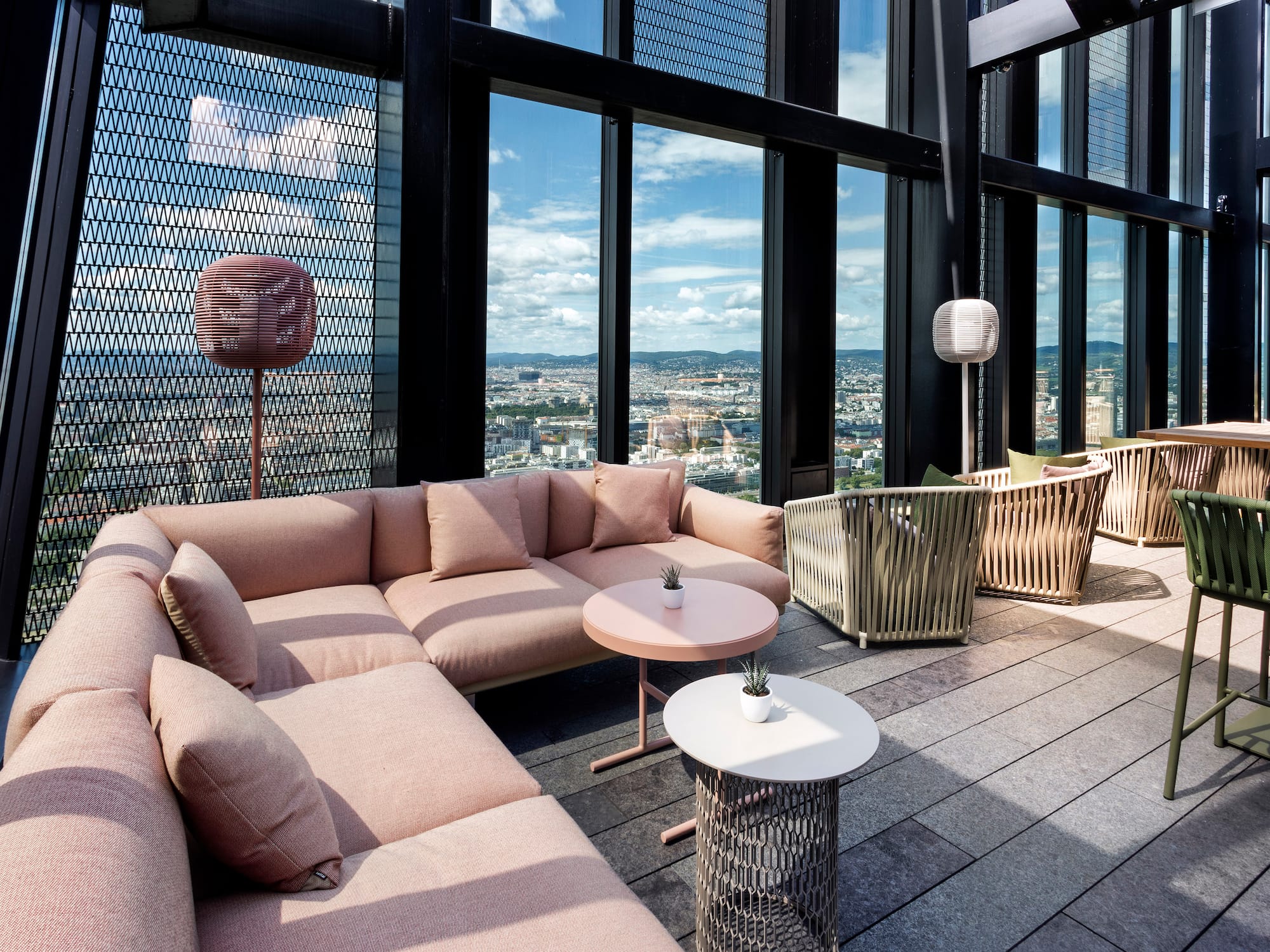 a room with a large window and a couch